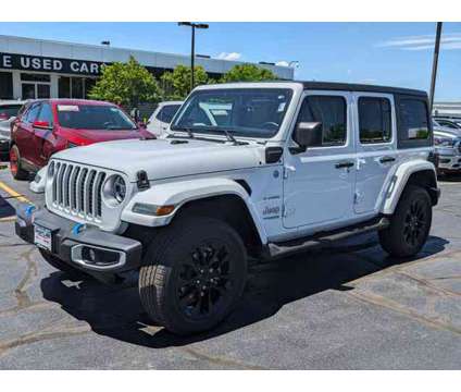 2022 Jeep Wrangler Unlimited Sahara 4xe is a White 2022 Jeep Wrangler Unlimited Car for Sale in Aurora CO