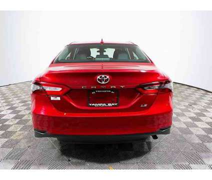 2023 Toyota Camry LE is a Red 2023 Toyota Camry LE Car for Sale in Tampa FL