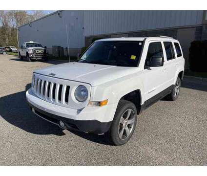 2016 Jeep Patriot HIGH ALTITUDE is a White 2016 Jeep Patriot High Altitude Car for Sale in Traverse City MI