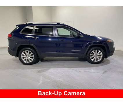 2014 Jeep Cherokee Limited is a Blue 2014 Jeep Cherokee Limited Car for Sale in Traverse City MI