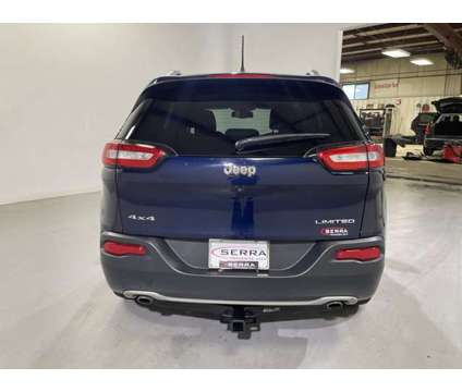 2014 Jeep Cherokee Limited is a Blue 2014 Jeep Cherokee Limited Car for Sale in Traverse City MI