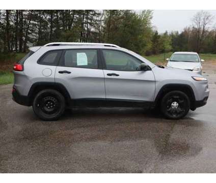 2014 Jeep Cherokee SPORT is a Silver 2014 Jeep Cherokee Sport Car for Sale in Traverse City MI