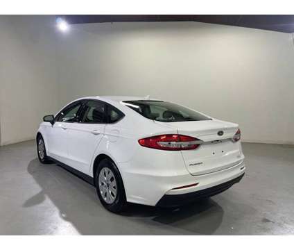 2020 Ford Fusion S is a White 2020 Ford Fusion S Car for Sale in Traverse City MI