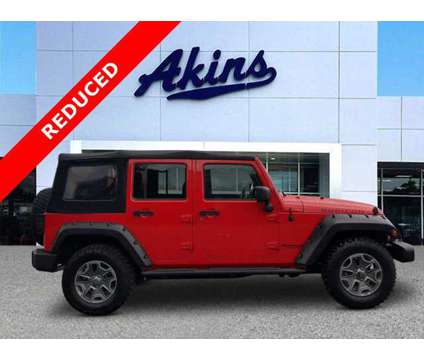 2015 Jeep Wrangler Unlimited Rubicon is a Red 2015 Jeep Wrangler Unlimited Rubicon Car for Sale in Winder GA