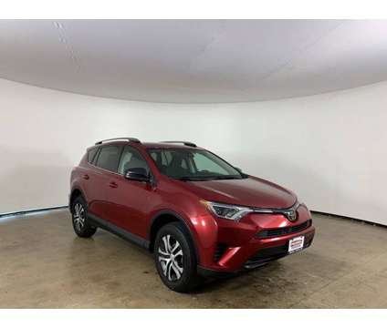 2018 Toyota RAV4 LE is a Red 2018 Toyota RAV4 LE Car for Sale in Peoria IL