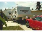 GREAT NEW PRICE!! RV lot with RV and Shed included.