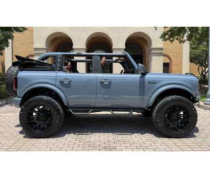 2024 Ford Bronco for sale is a Blue, Grey 2024 Ford Bronco Car for Sale in Tampa FL