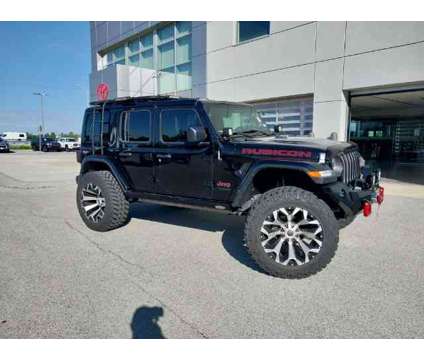 2018 Jeep Wrangler Unlimited Rubicon is a Black 2018 Jeep Wrangler Unlimited Rubicon SUV in Whitestown IN