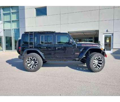 2018 Jeep Wrangler Unlimited Rubicon is a Black 2018 Jeep Wrangler Unlimited Rubicon SUV in Whitestown IN