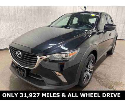 2018 Mazda CX-3 Touring AWD is a Black 2018 Mazda CX-3 Touring SUV in Saint Charles IL