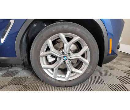 2021 BMW X3 xDrive30i is a Blue 2021 BMW X3 xDrive30i SUV in Milwaukee WI
