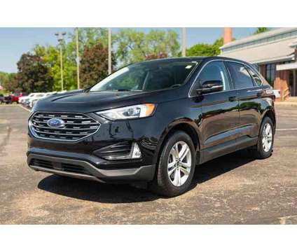 2020 Ford Edge SEL AWD is a Black 2020 Ford Edge SEL SUV in Canton OH
