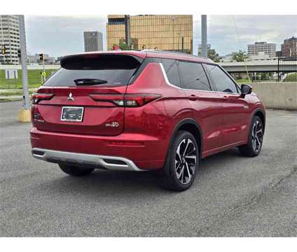 2024 Mitsubishi Outlander PHEV SEL is a Red 2024 Mitsubishi Outlander SEL SUV in Chattanooga TN