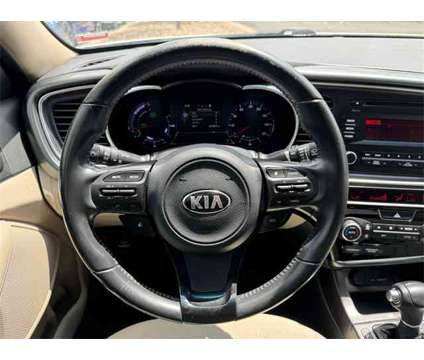 2014 Kia Optima Hybrid LX is a Silver 2014 Kia Optima Hybrid LX Hybrid in Lees Summit MO