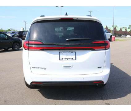 2024 Chrysler Pacifica Touring L is a White 2024 Chrysler Pacifica Touring Car for Sale in Fowlerville MI