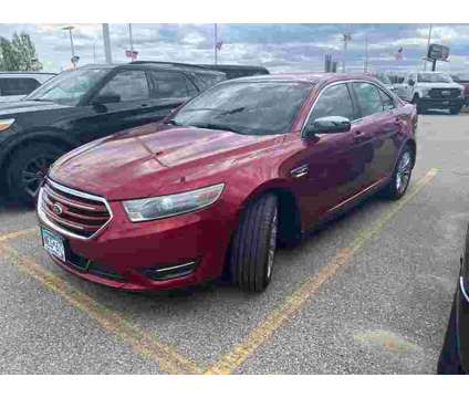 2014 Ford Taurus Limited is a Red 2014 Ford Taurus Limited Sedan in Rochester MN
