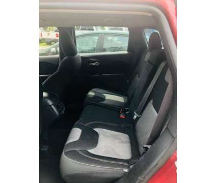 2014 Jeep Cherokee Sport is a Red 2014 Jeep Cherokee Sport SUV in Fort Lauderdale FL