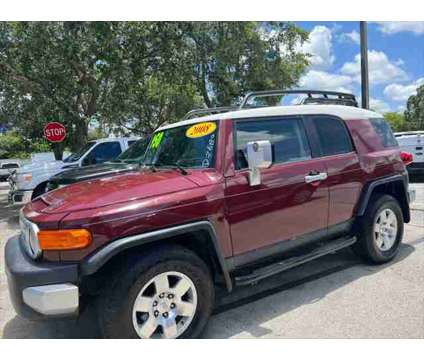2008 Toyota FJ Cruiser RWD 4dr Auto (Natl) is a Red 2008 Toyota FJ Cruiser RWD 4dr Auto (Natl) Car for Sale in Fort Lauderdale FL