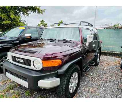 2007 Toyota FJ Cruiser 2WD 4dr Auto (Natl) is a Red 2007 Toyota FJ Cruiser 2WD 4dr Auto (Natl) Car for Sale in Fort Lauderdale FL