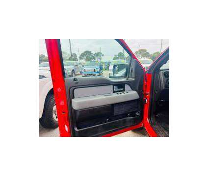 2012 Ford F-150 XLT is a Black 2012 Ford F-150 XLT Car for Sale in Fort Lauderdale FL