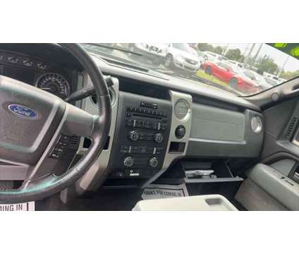 2012 Ford F-150 XLT is a Blue 2012 Ford F-150 XLT Truck in Fort Lauderdale FL
