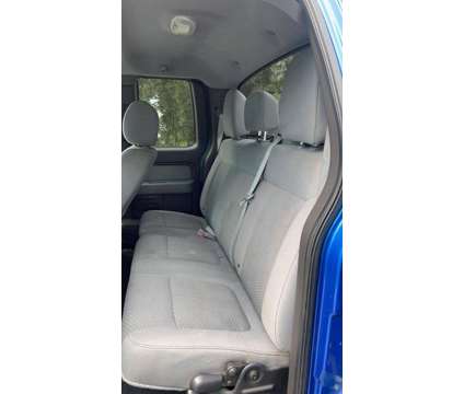 2012 Ford F-150 XLT is a Blue 2012 Ford F-150 XLT Truck in Fort Lauderdale FL