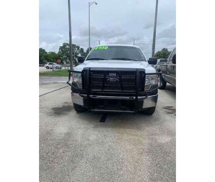 2014 Ford F-150 XLT is a White 2014 Ford F-150 XLT Truck in Fort Lauderdale FL