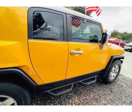 2007 Toyota FJ Cruiser 2WD 4dr Auto (Natl) is a Yellow 2007 Toyota FJ Cruiser 2WD 4dr Auto (Natl) Car for Sale in Fort Lauderdale FL
