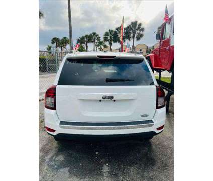 2014 Jeep Compass Latitude is a White 2014 Jeep Compass Latitude SUV in Fort Lauderdale FL