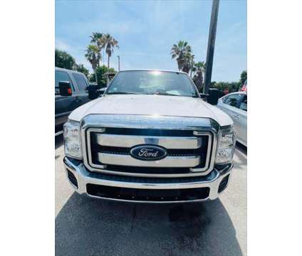 2013 Ford F-250 XLT is a White 2013 Ford F-250 XLT Car for Sale in Fort Lauderdale FL