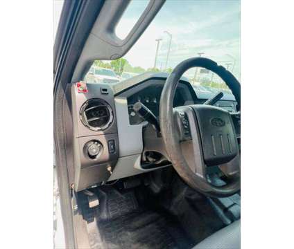 2013 Ford F-250 XLT is a White 2013 Ford F-250 XLT Car for Sale in Fort Lauderdale FL
