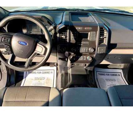 2015 Ford F-150 XLT is a White 2015 Ford F-150 XLT Car for Sale in Fort Lauderdale FL