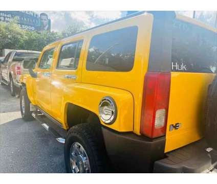 2006 Hummer H3 4dr 4WD SUV is a Yellow 2006 Hummer H3 4dr 4WD SUV SUV in Fort Lauderdale FL