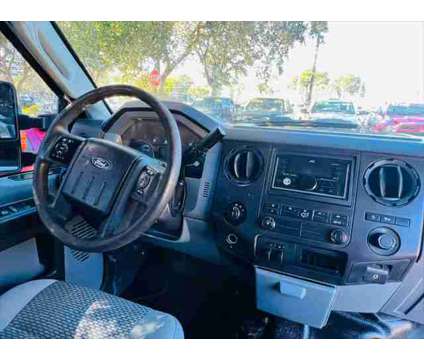 2012 Ford F-250 XLT is a White 2012 Ford F-250 XLT Car for Sale in Fort Lauderdale FL