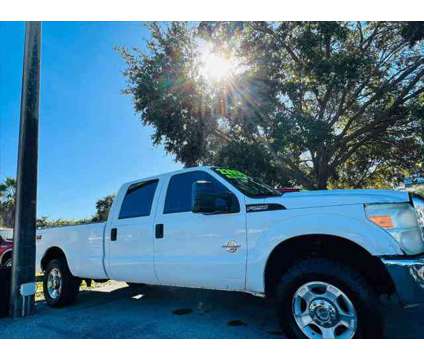 2012 Ford F-250 XLT is a White 2012 Ford F-250 XLT Car for Sale in Fort Lauderdale FL