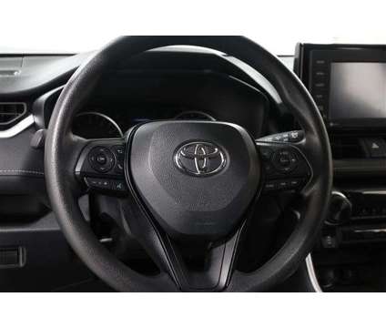 2021 Toyota RAV4 LE is a Red 2021 Toyota RAV4 LE SUV in Mentor OH