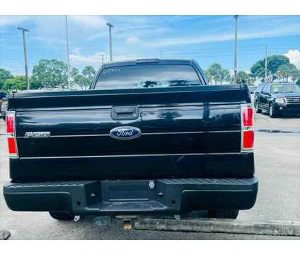 2013 Ford F-150 XLT is a Black 2013 Ford F-150 XLT Truck in Fort Lauderdale FL
