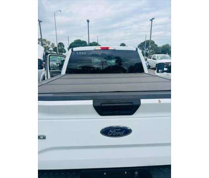 2015 Ford F-150 XLT is a White 2015 Ford F-150 XLT Truck in Fort Lauderdale FL
