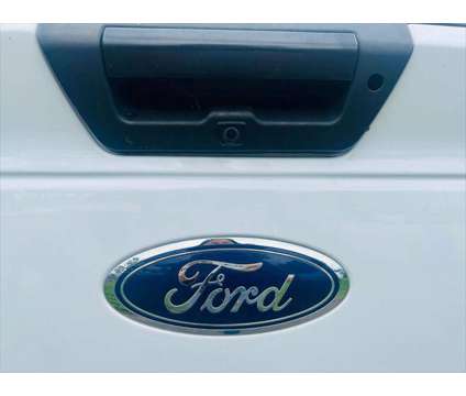 2015 Ford F-150 XLT is a White 2015 Ford F-150 XLT Truck in Fort Lauderdale FL