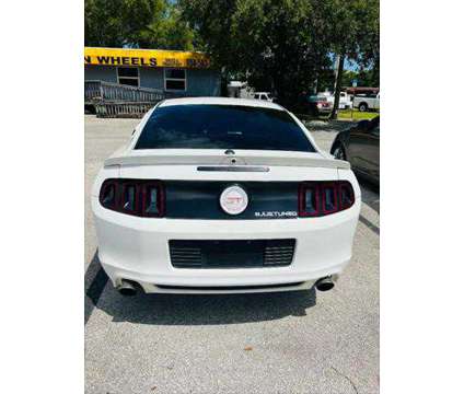 2013 Ford Mustang GT Premium is a White 2013 Ford Mustang GT Coupe in Fort Lauderdale FL