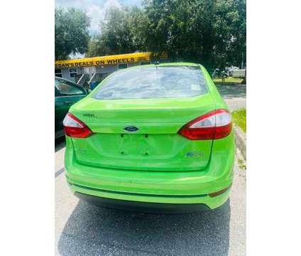2014 Ford Fiesta SE is a Green 2014 Ford Fiesta SE Car for Sale in Fort Lauderdale FL
