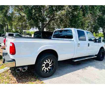2011 Ford F-350 XLT 4x2 4dr Crew Cab 8 ft. LB SRW Pickup is a White 2011 Ford F-350 XLT Truck in Fort Lauderdale FL