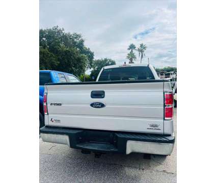 2014 Ford F-150 XLT is a Silver 2014 Ford F-150 XLT Truck in Fort Lauderdale FL