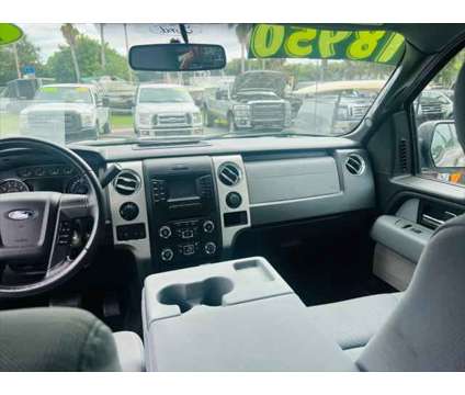 2014 Ford F-150 XLT is a Silver 2014 Ford F-150 XLT Truck in Fort Lauderdale FL