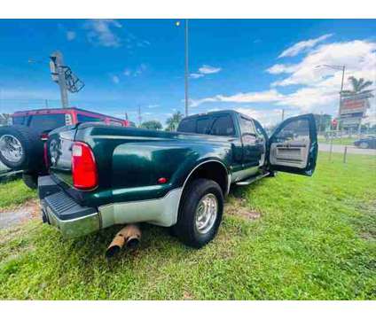 2010 Ford F-350 LARIAT is a Green 2010 Ford F-350 Lariat Truck in Fort Lauderdale FL