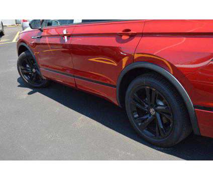 2024 Volkswagen Tiguan 2.0T SE R-Line Black is a Red 2024 Volkswagen Tiguan 2.0T SUV in Highland Park IL