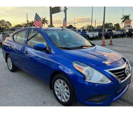 2016 Nissan Versa 1.6 S+ is a Blue 2016 Nissan Versa 1.6 Trim Car for Sale in Fort Lauderdale FL