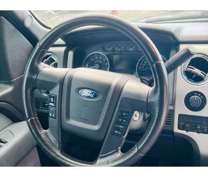 2014 Ford F-150 FX4 4x4 4dr SuperCrew Styleside 6.5 ft. SB is a White 2014 Ford F-150 FX4 Car for Sale in Fort Lauderdale FL