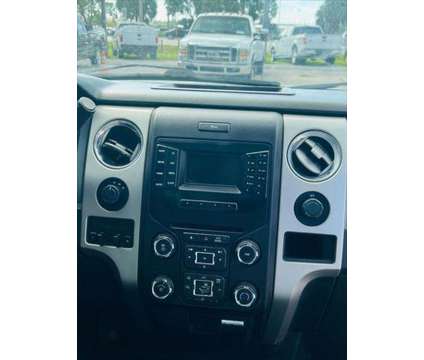 2014 Ford F-150 FX4 4x4 4dr SuperCrew Styleside 6.5 ft. SB is a White 2014 Ford F-150 FX4 Car for Sale in Fort Lauderdale FL