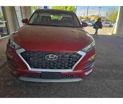 2019 Hyundai Tucson SEL is a Red 2019 Hyundai Tucson SUV in Santa Fe NM